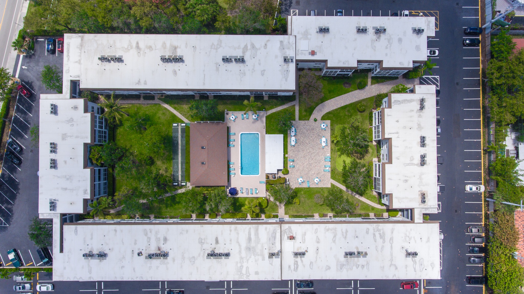 Aerial view of the community pool and patio